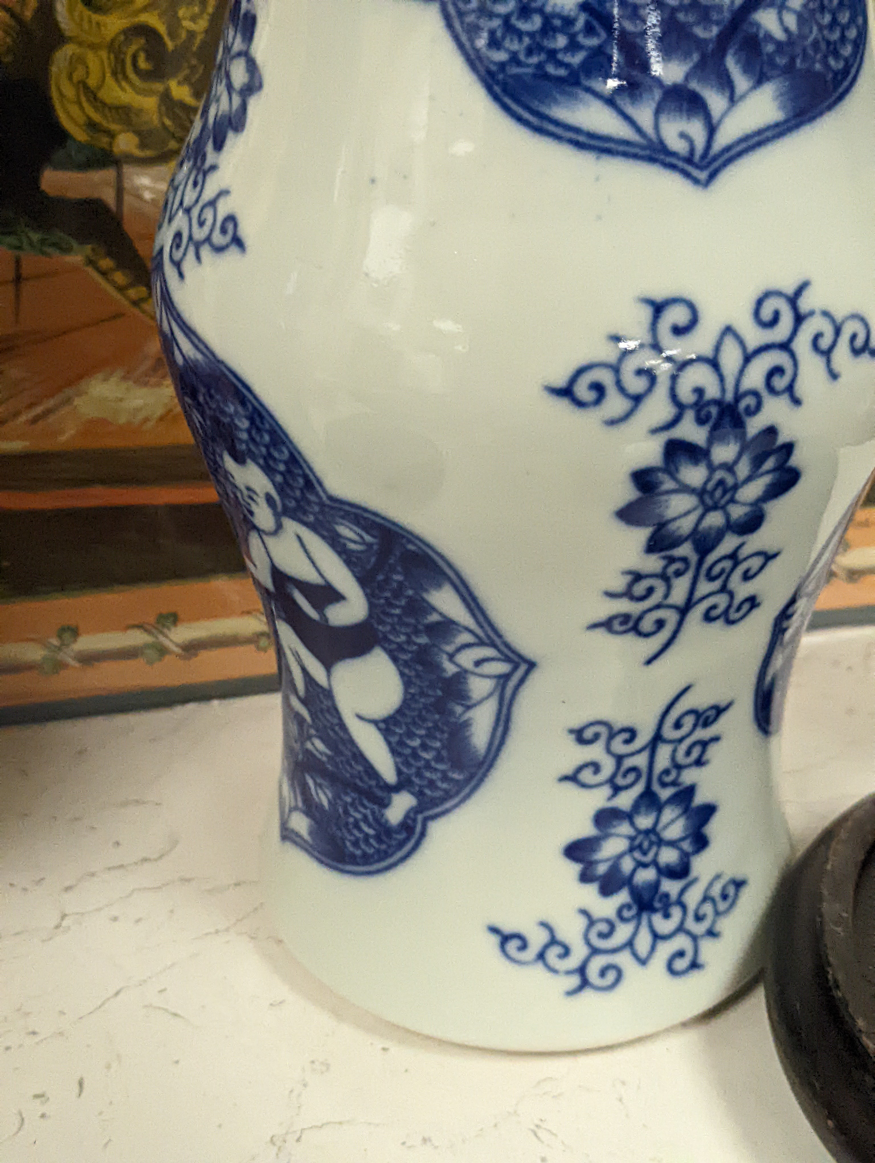 A pair of Chinese blue and white vases on stands and 6 further wood stands. Vases 35cm